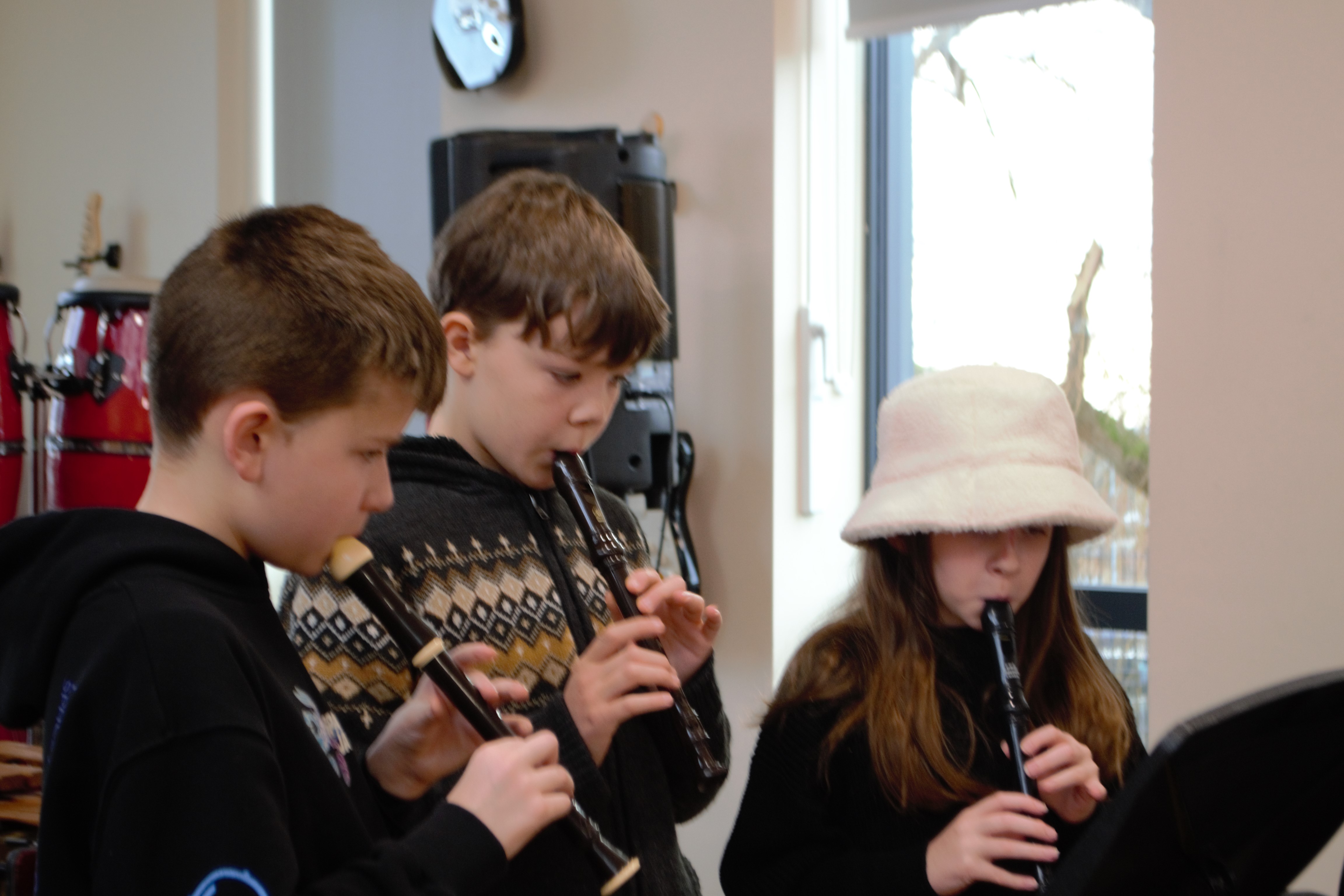 Children playing recorders